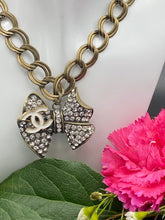 Load image into Gallery viewer, Bronze Rhinestone Designer Button Logo Necklace